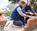 Making strong foundations - Teaching the basics. Shot of brickla